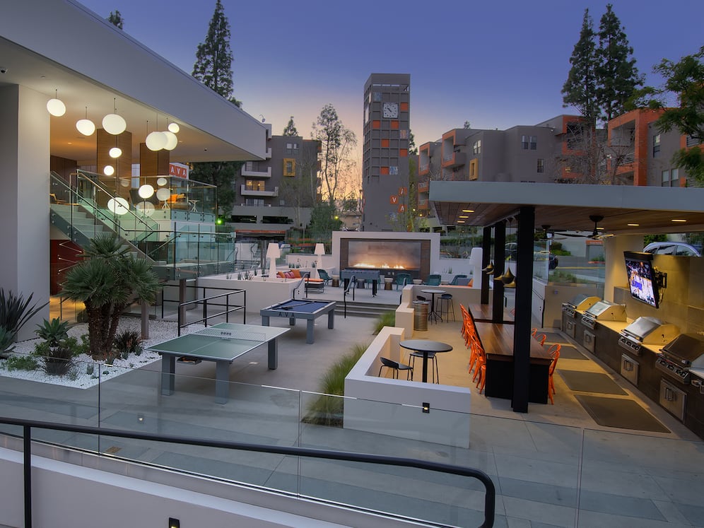 Outdoor Lounge with Seating Fire Pit and Game Tables