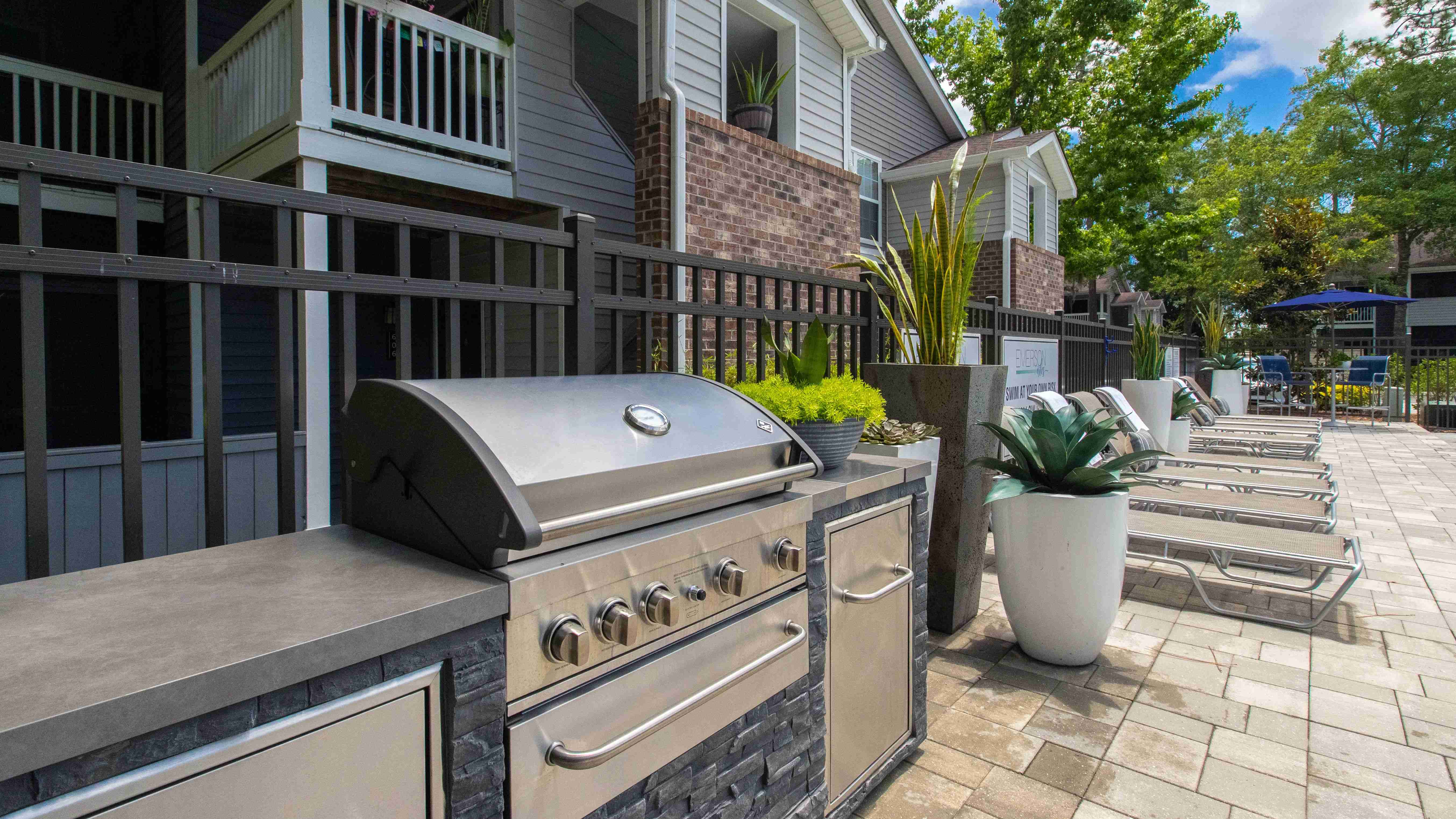 Elevate your poolside experience with al fresco dining and entertaining at our outdoor kitchen.