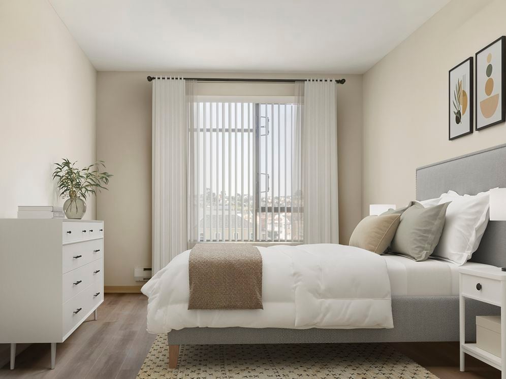 Updated Finishes bedroom with hard surface flooring