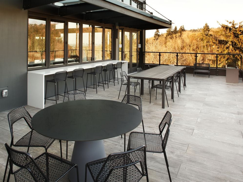 Phase II Courtyard with grills and dining tables