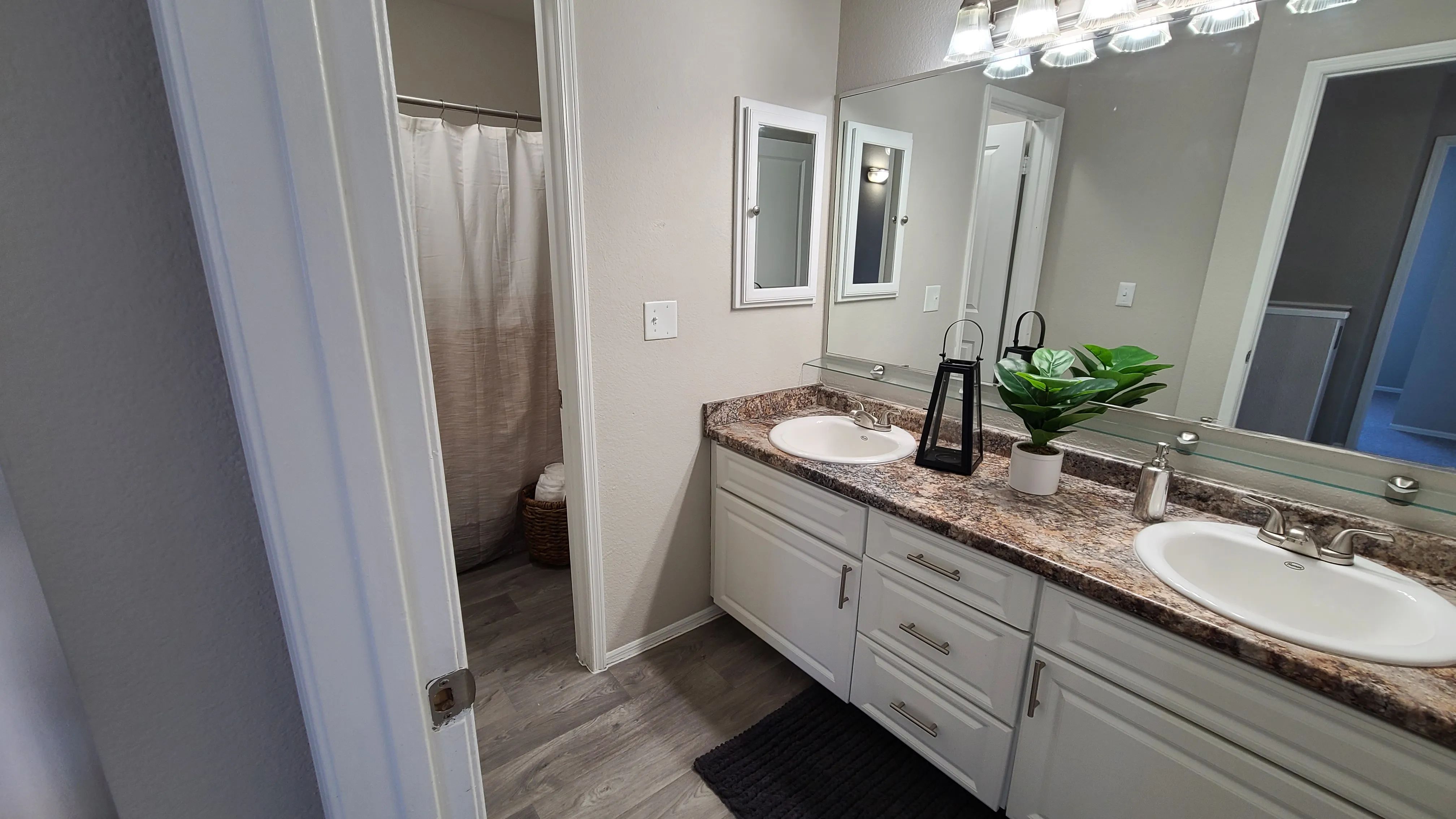 Savor dream bathrooms designed for comfortable living with double sinks and ample storage space.