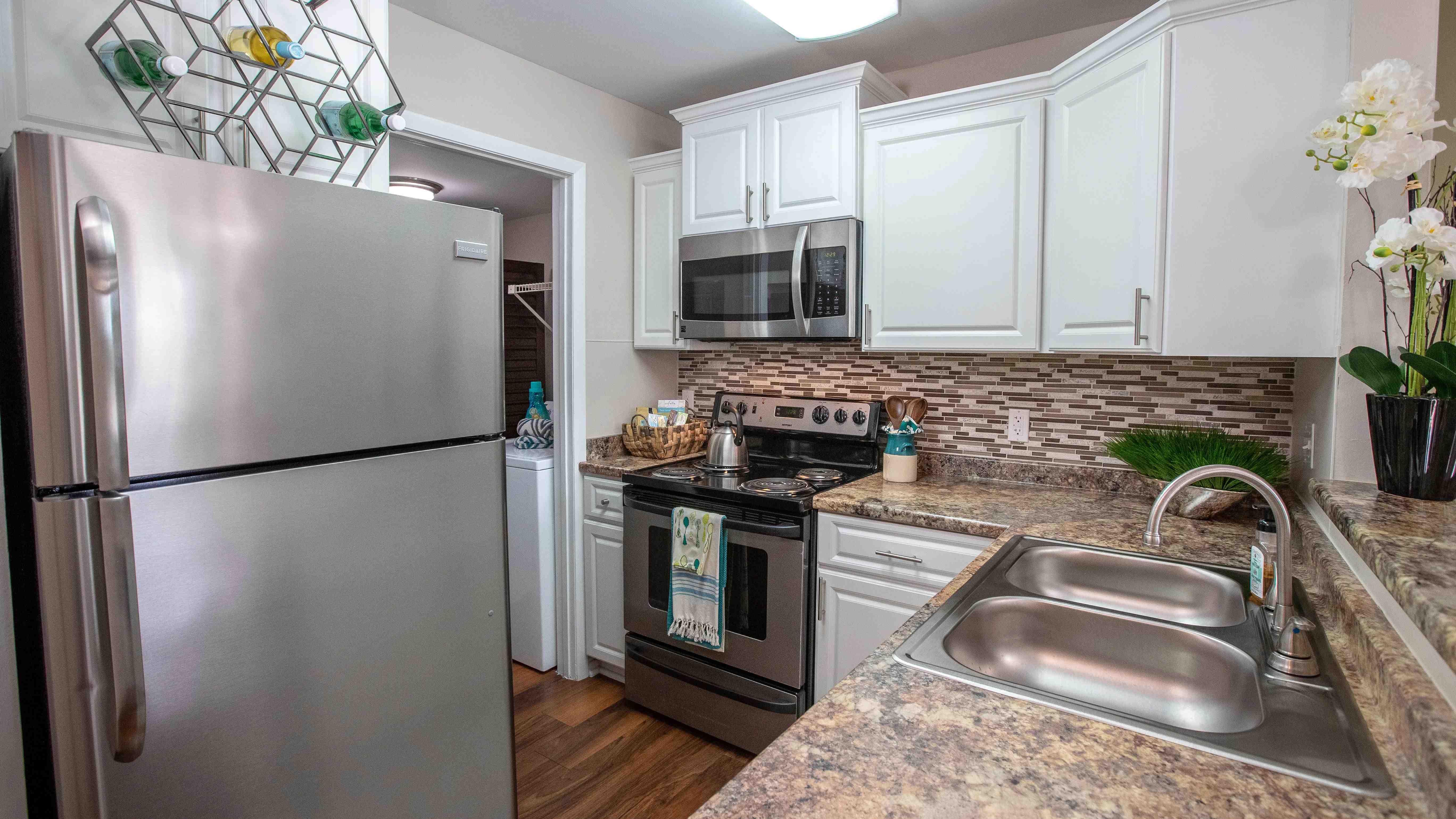 Indulge in our spacious, contemporary kitchens equipped with modern amenities.