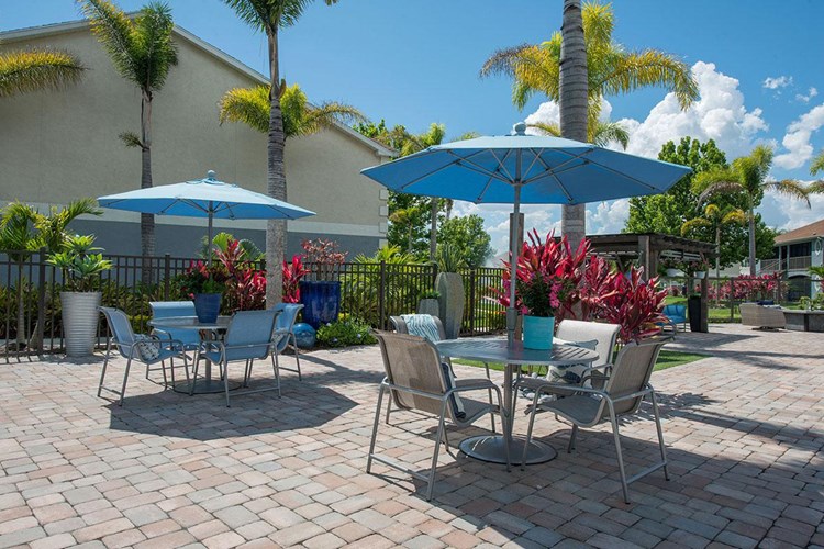 Our expansive sundeck features plenty of tables with umbrellas.