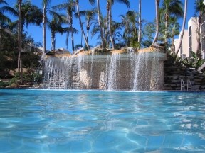 Relax by our waterfall pool