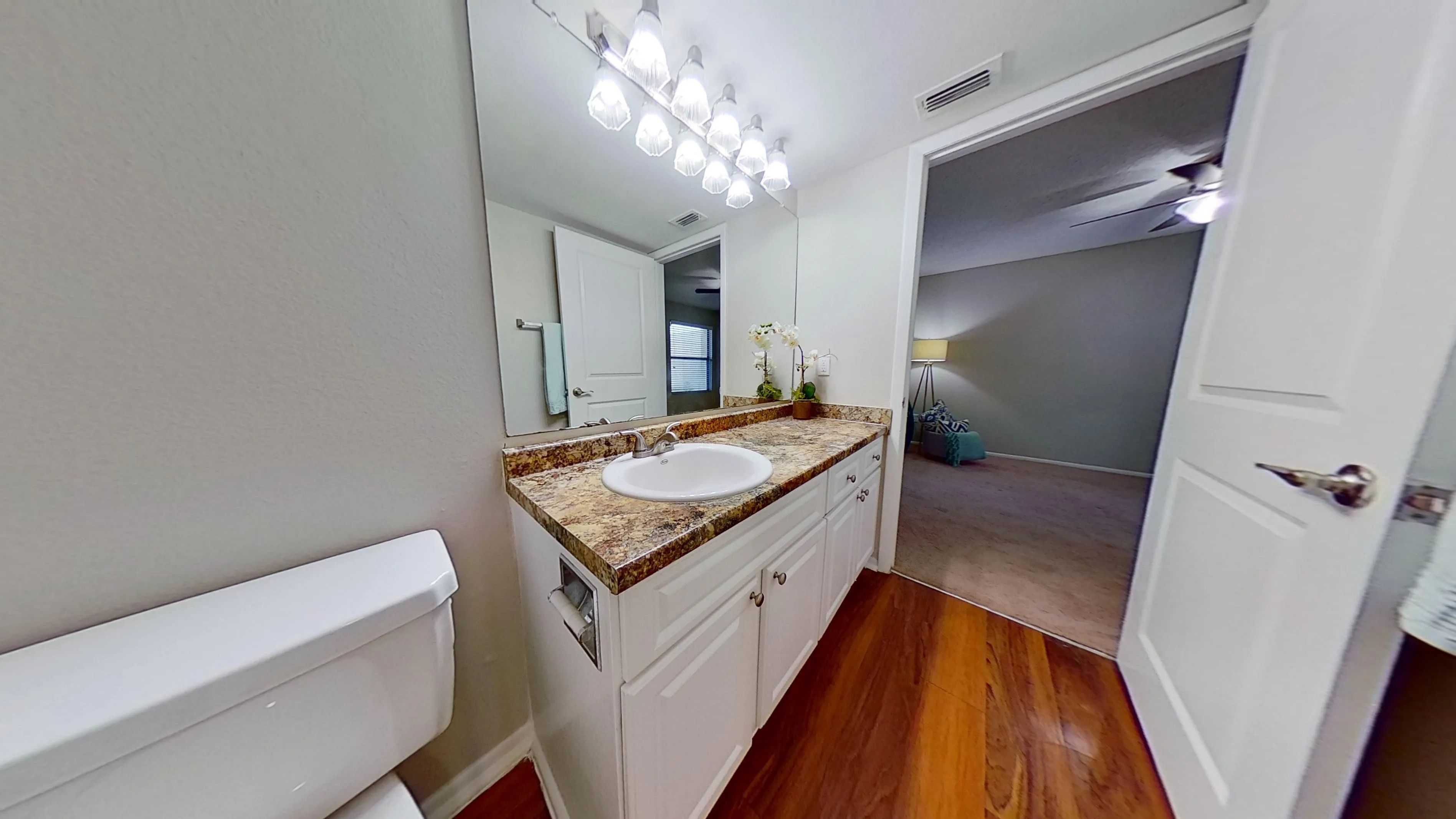 The Newport Autograph floor plan features granite countertops, ample storage, and direct access to the bedroom. This space is designed to provide a seamless blend of functionality and comfort.