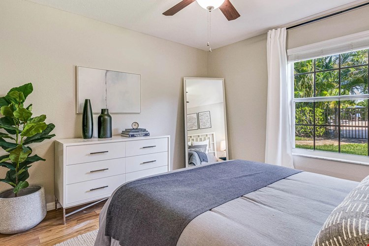 Each bedroom includes a multi-speed ceiling fan and large window.