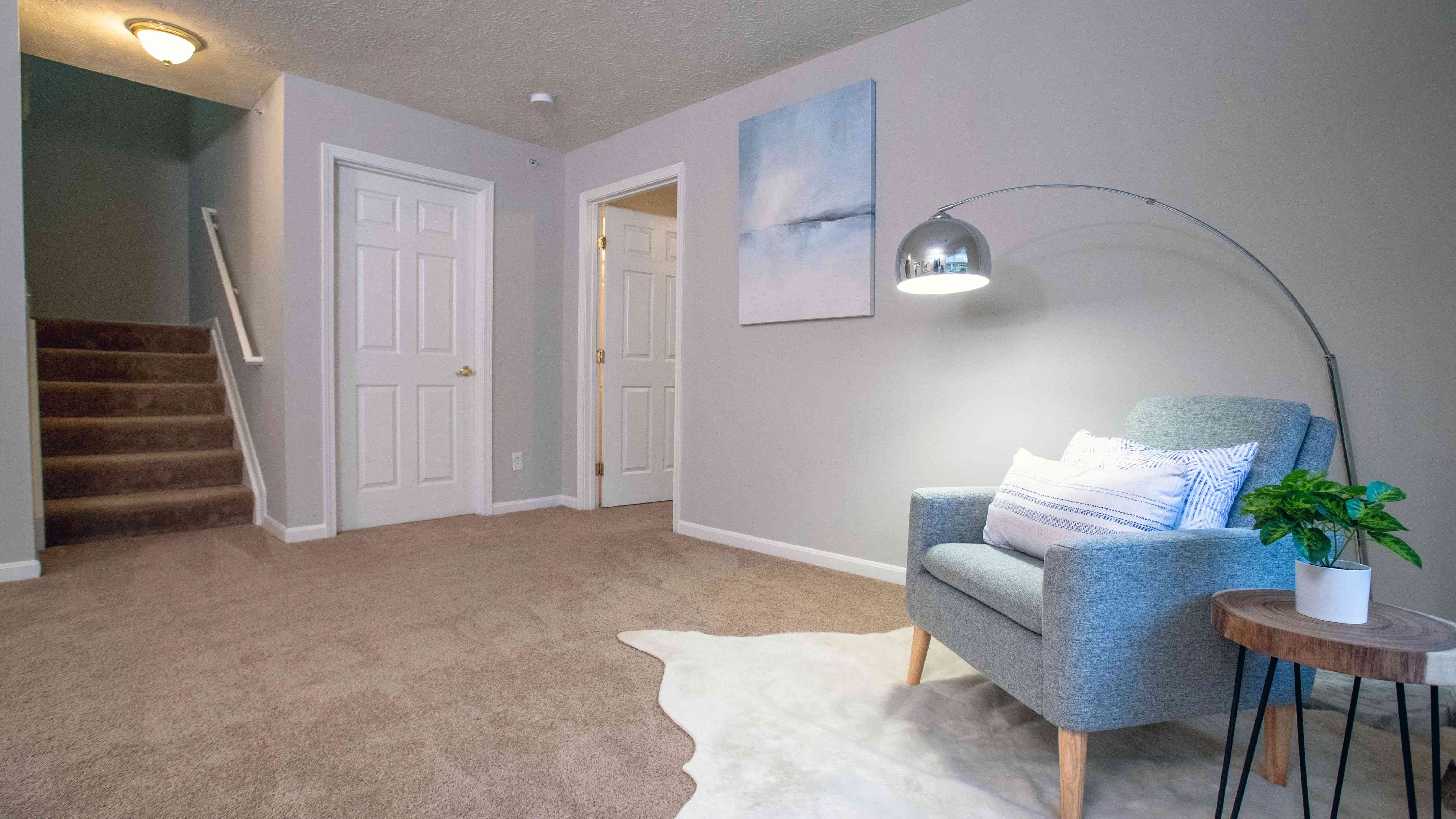 Revel in generously-sized living rooms with plush carpeting.