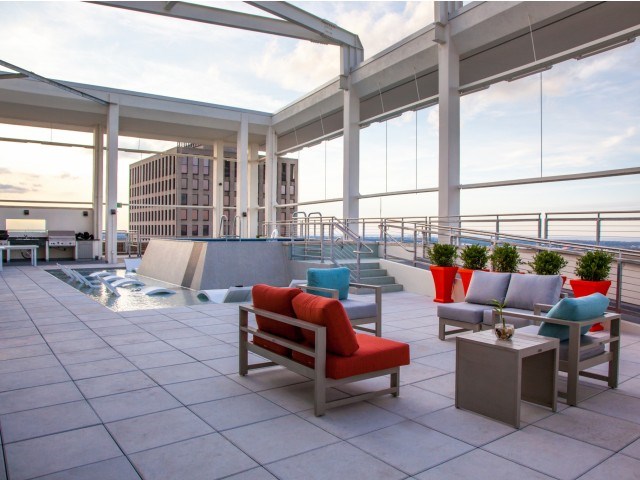 Sitting Area for Rooftop Pool at the Strand Apartments