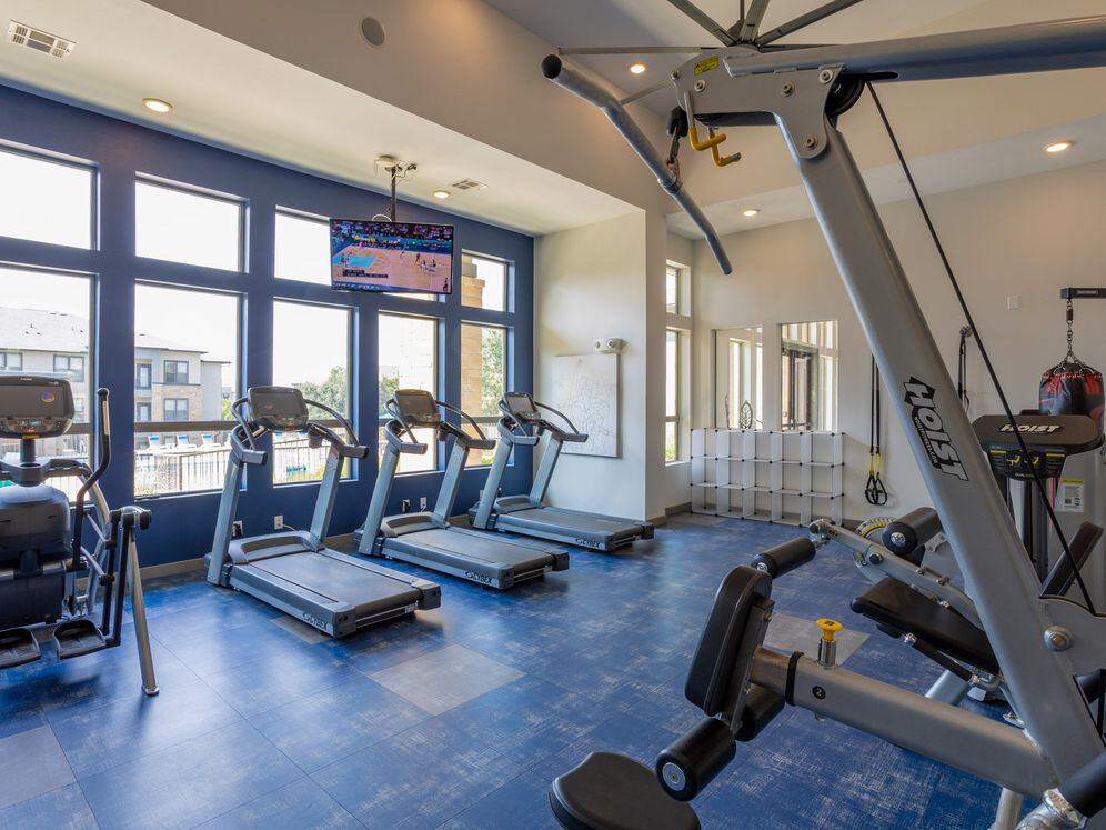 State-of-the-art fitness center with cardio equipment