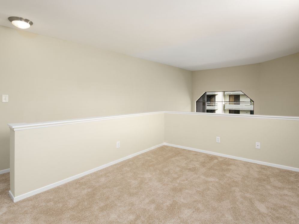 Loft area with carpet