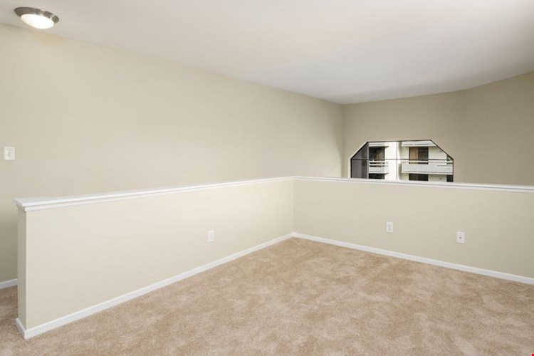 Loft area with carpet