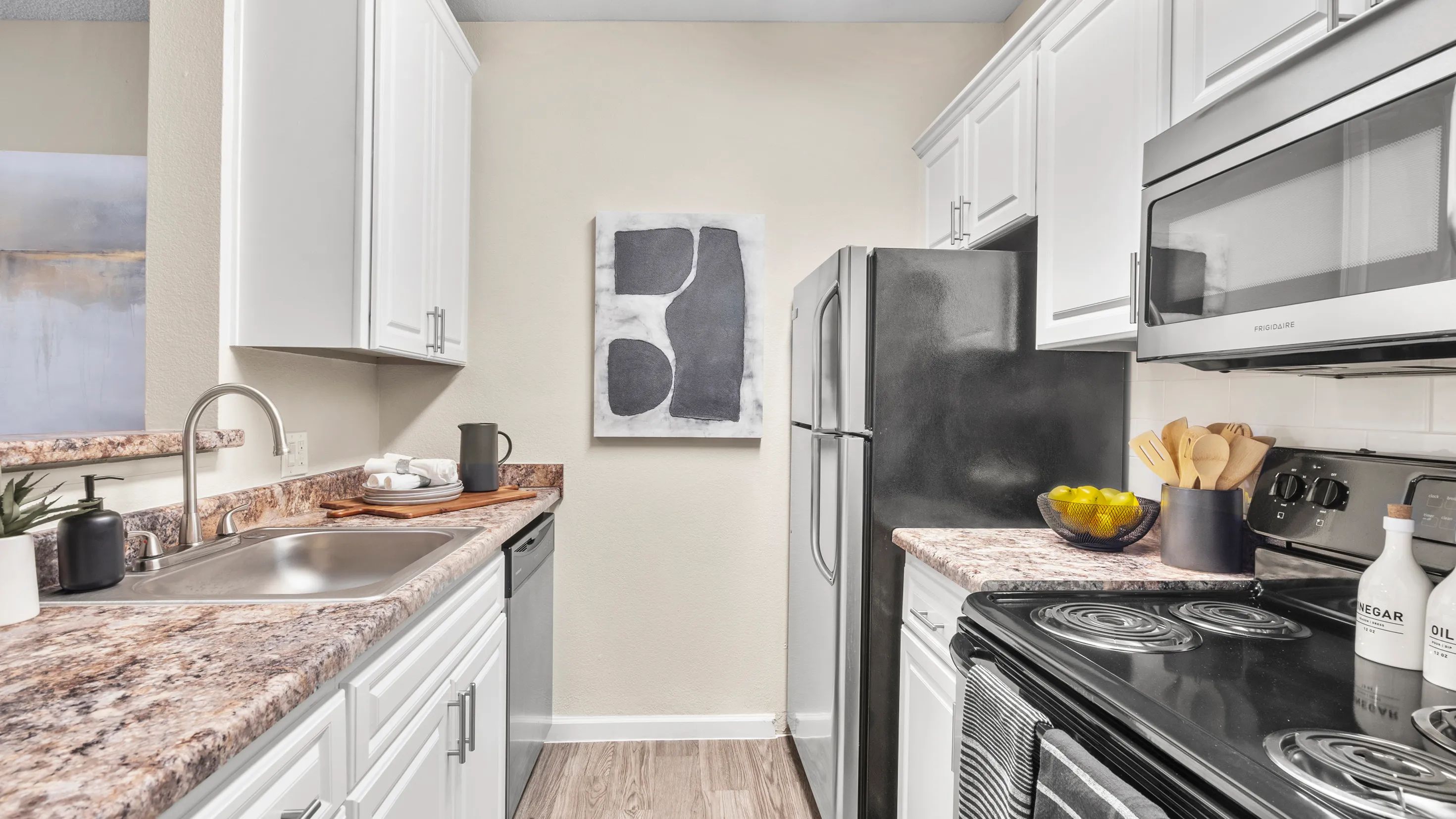 Embrace sleek, top-of-the-line appliances for refined culinary delights in your new home.  