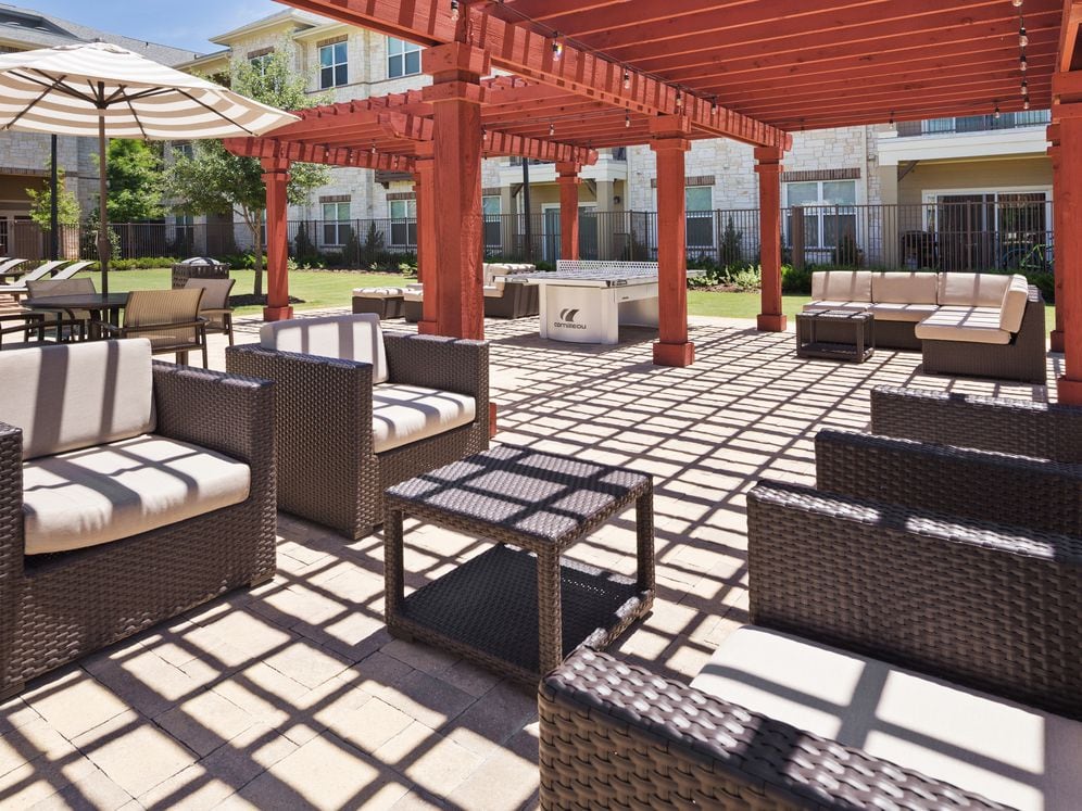 Courtyard with lounge seating and grilling stations