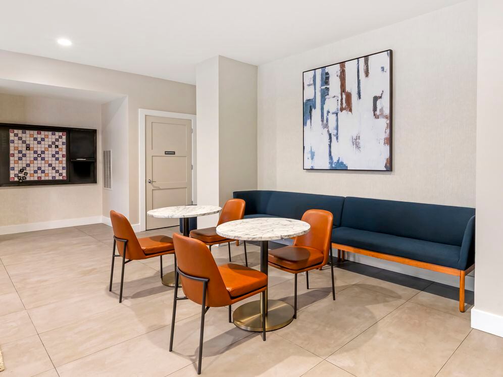 Resident lounge game room with lounge seating