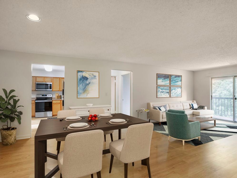 Upgraded Package I living and dining areas with hard surface flooring and balcony access