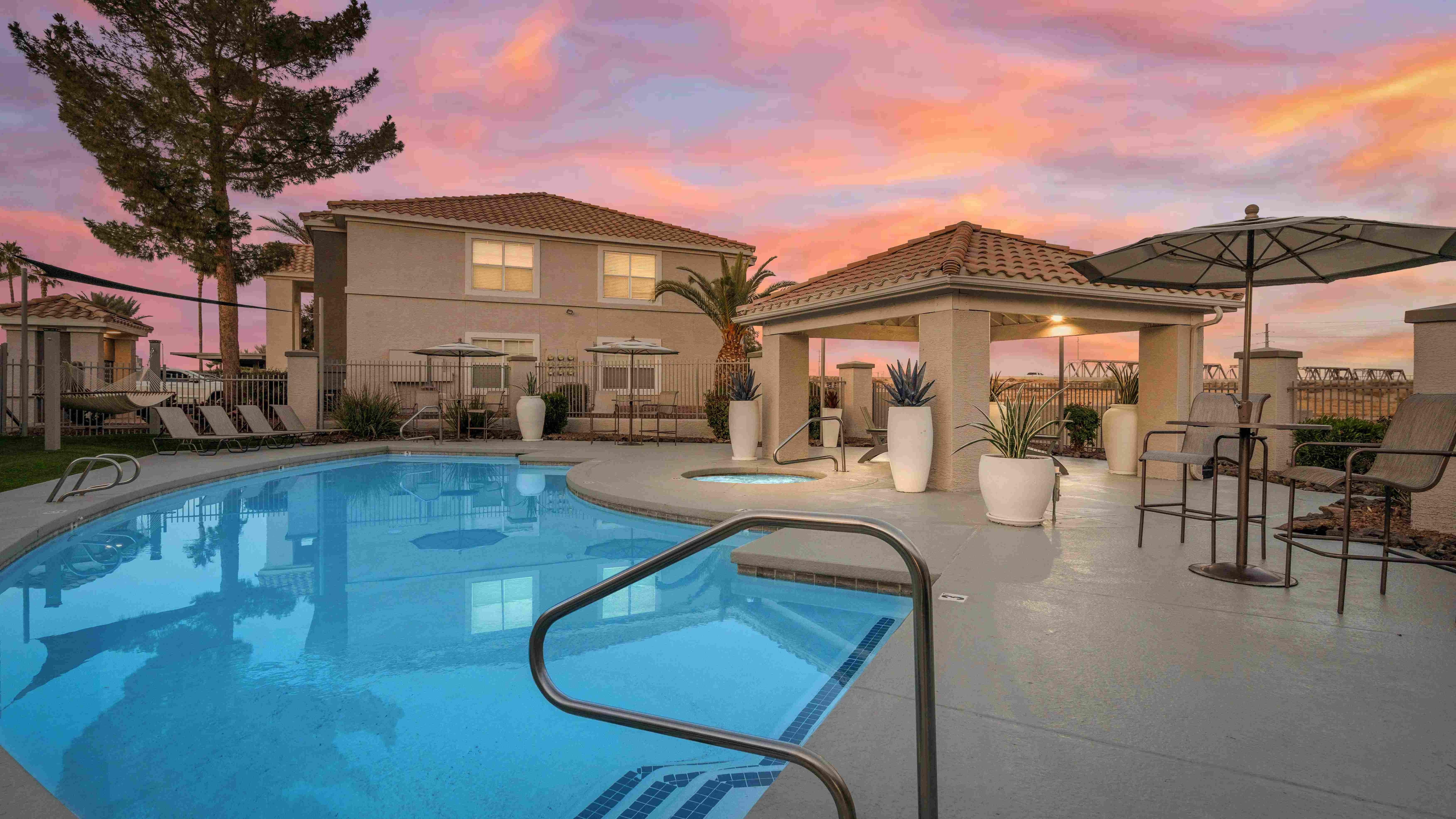 Experience the magic of Arizona evenings at our resort-style pool and spa. With plush loungers, shaded seating, and a serene ambiance, it's the perfect place to relax and unwind under a breathtaking sunset.