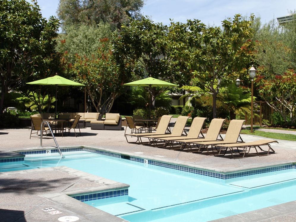 Swimming pool, sundeck with lounge seating