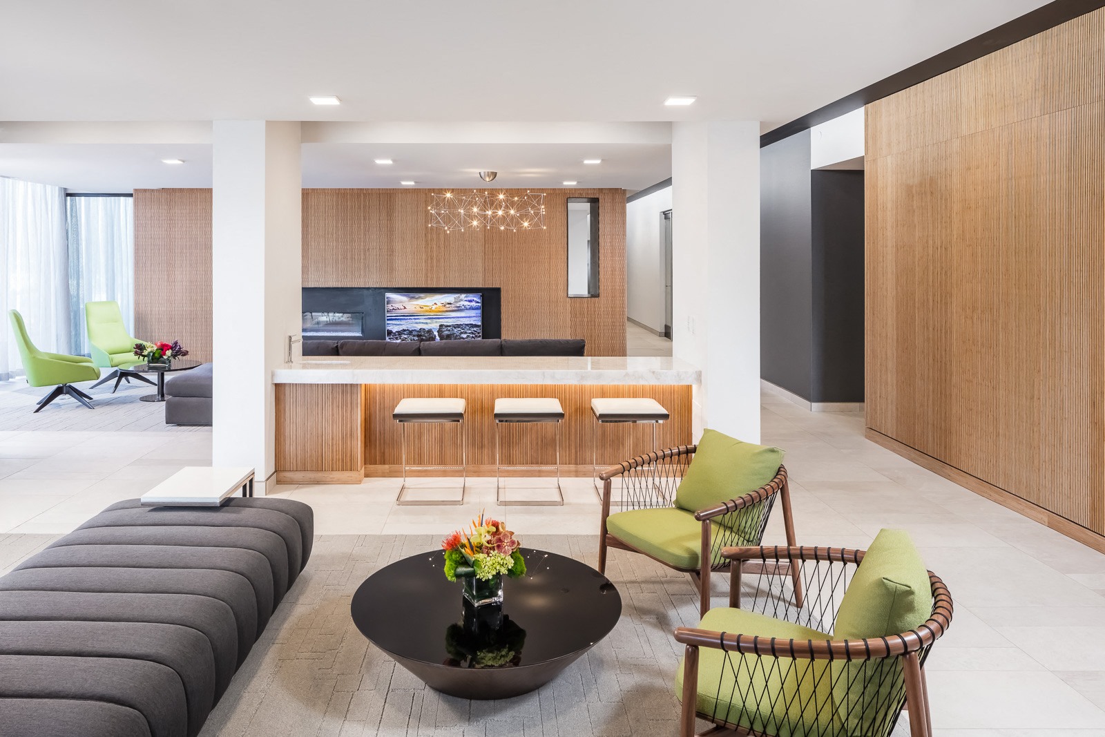 Hotel inspired lobby with mid-century finishes