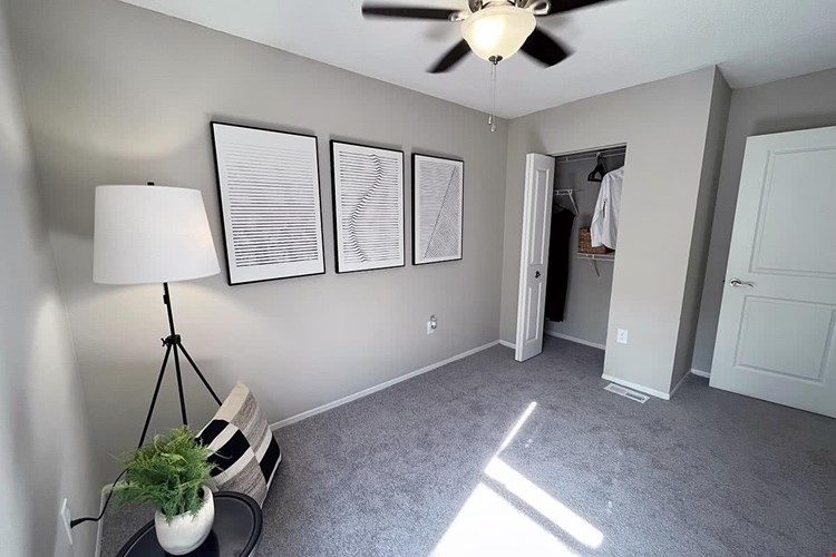 Over sized bedroom featuring excellent closet space.