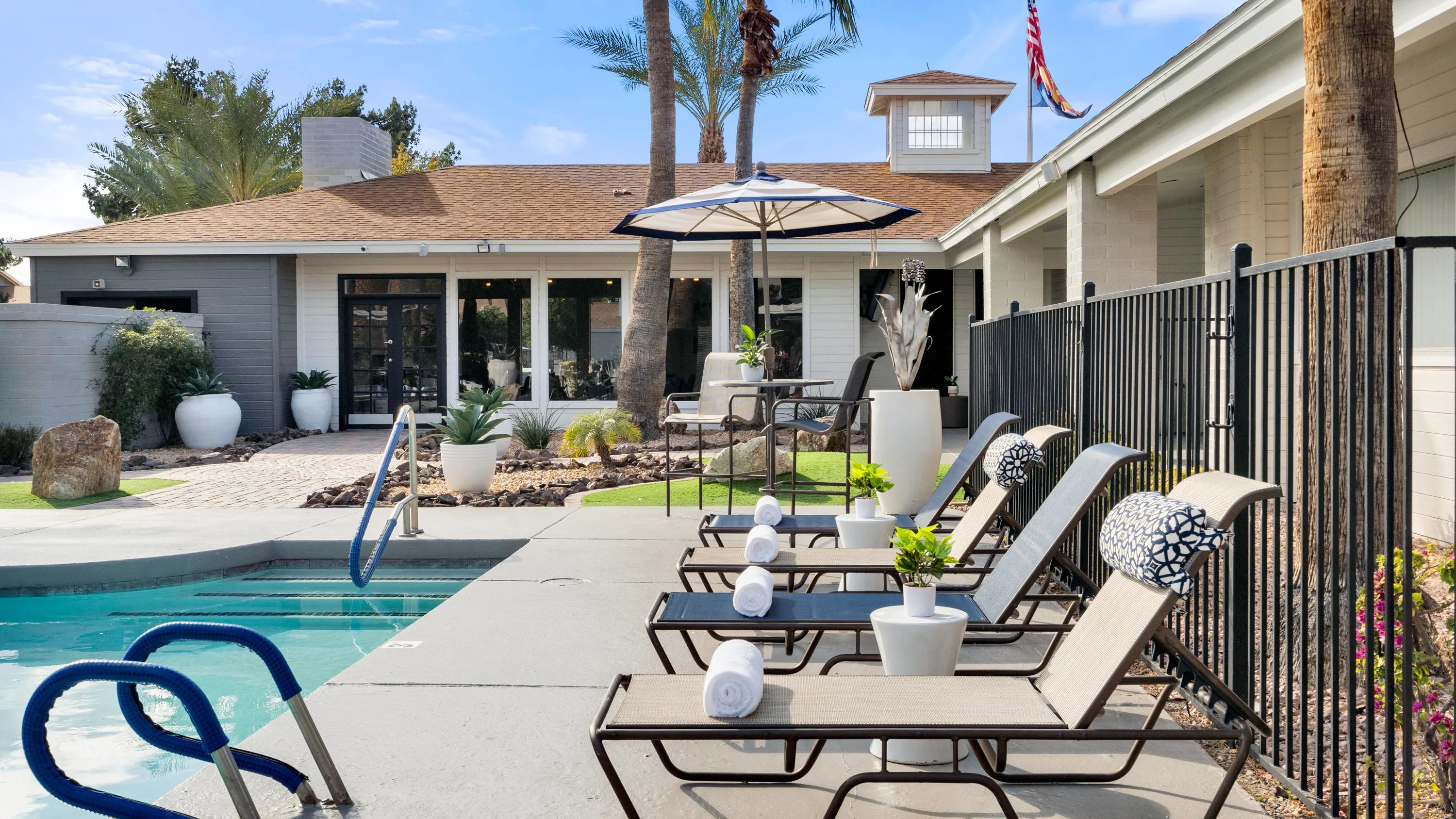 Soak in the Arizona sunshine on our expansive sundeck with cozy sun loungers around the pool. 