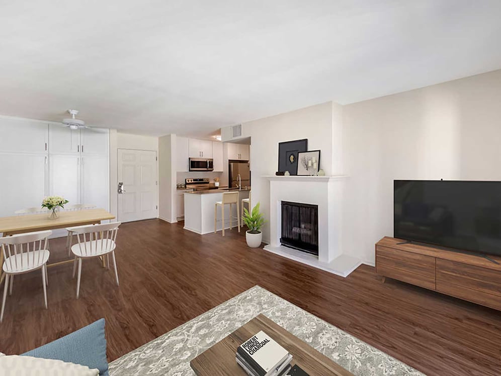Renovated Package I kitchen, dining, and living area with hard surface flooring