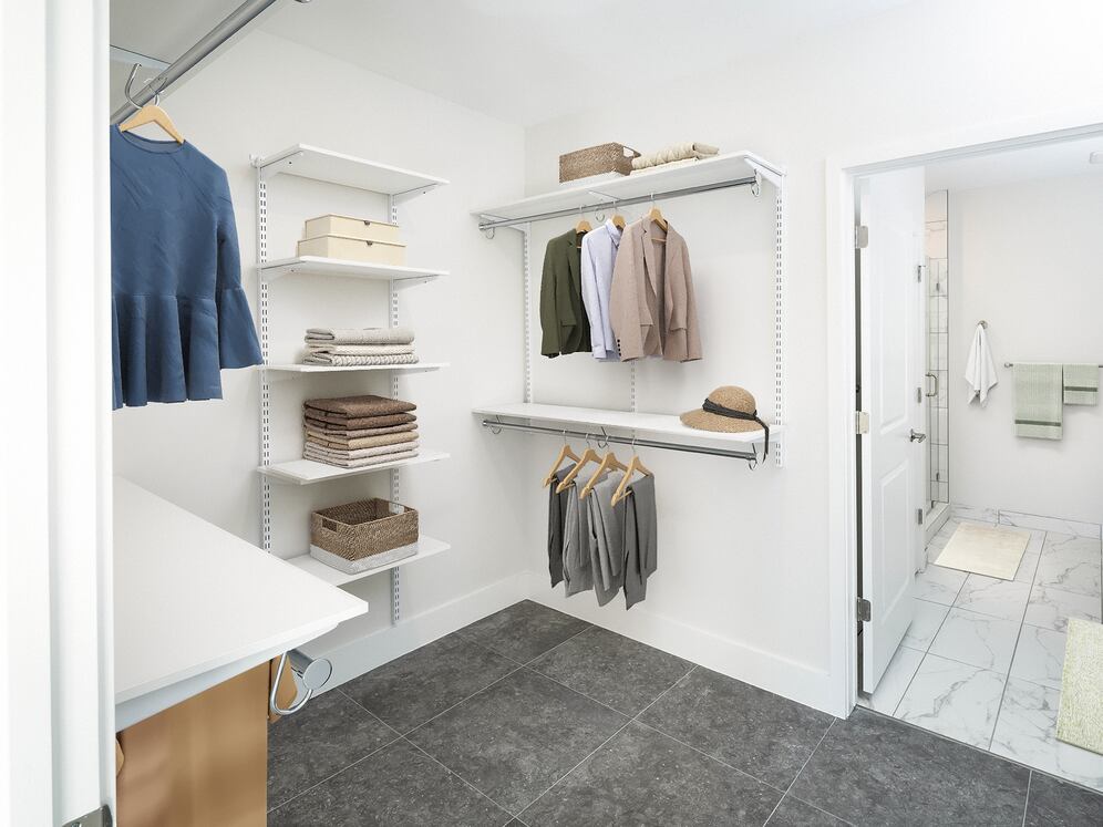Signature Collection Townhome primary bedroom with spacious walk-in closet