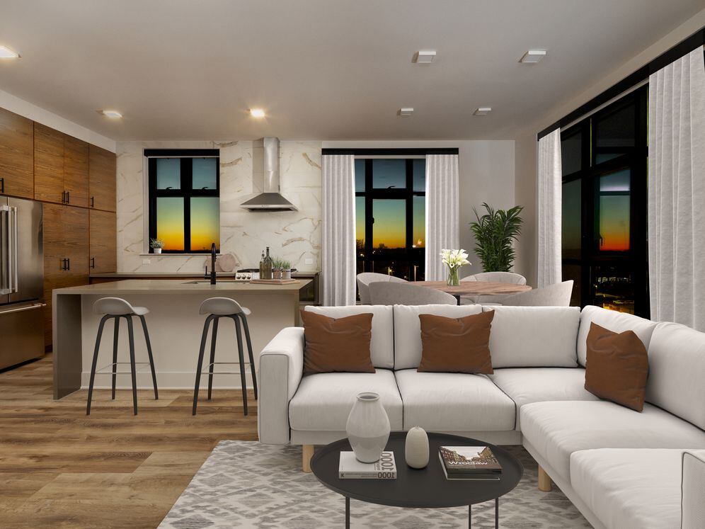 Kitchen, living, and dining areas with hard surface flooring throughout and floor-to-ceiling windows