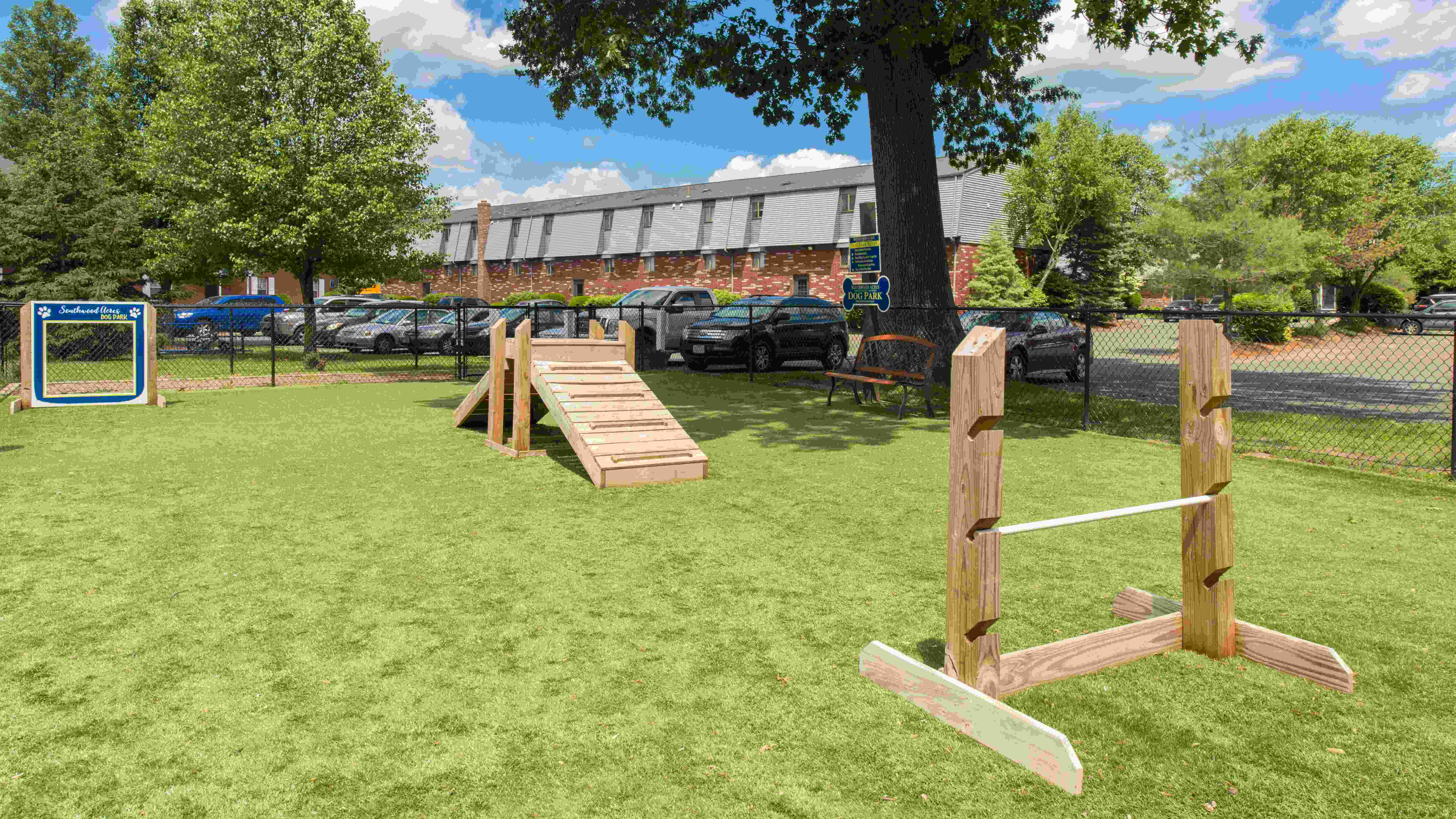 Let your furry friend frolic and make new pals in our dog park, designed with agility equipment and a cozy bench for pet parents.