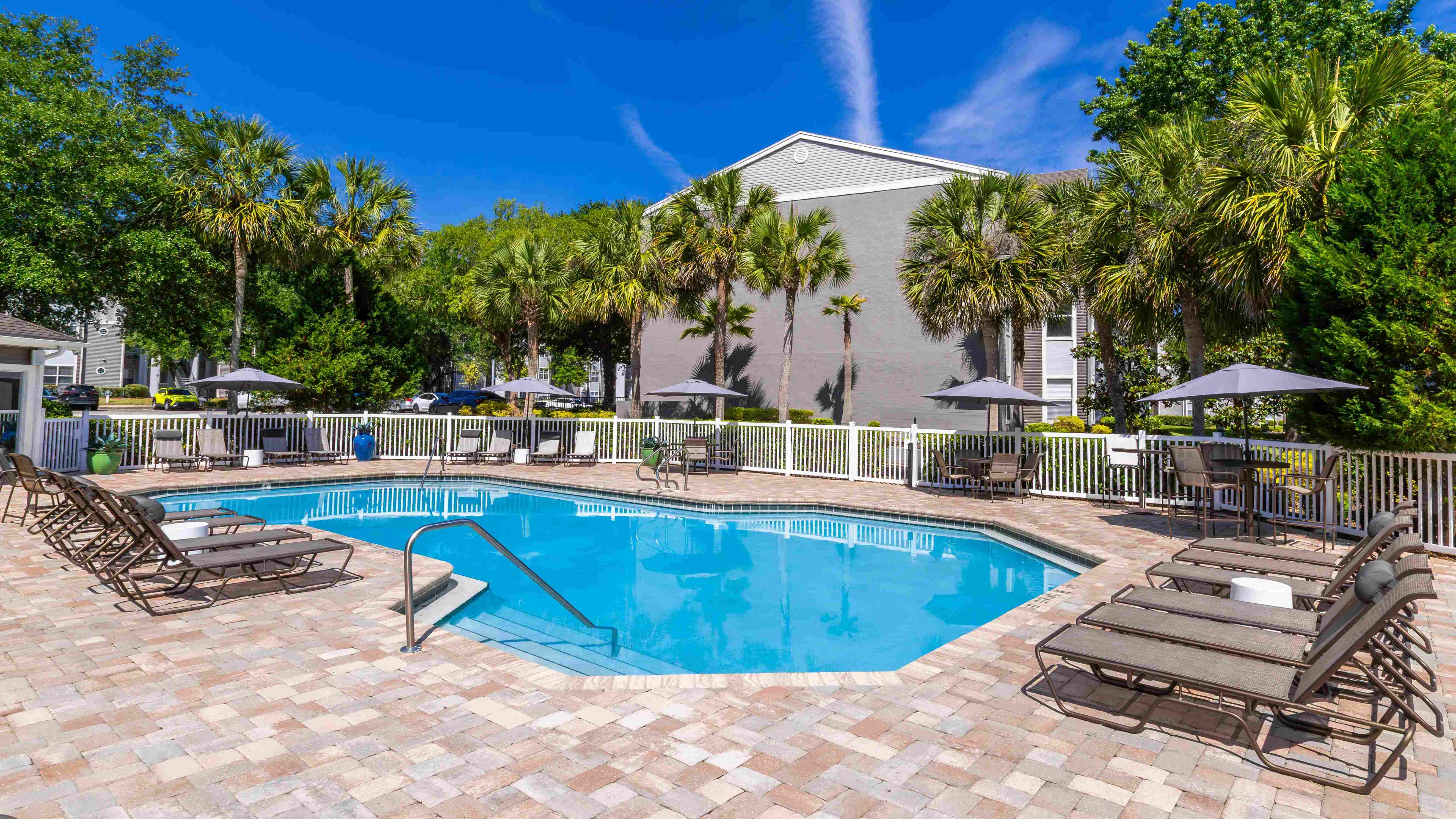 Our resort-style pool features shaded seating, modern loungers, and a beautifully landscaped sundeck that’s perfect for relaxing or entertaining.