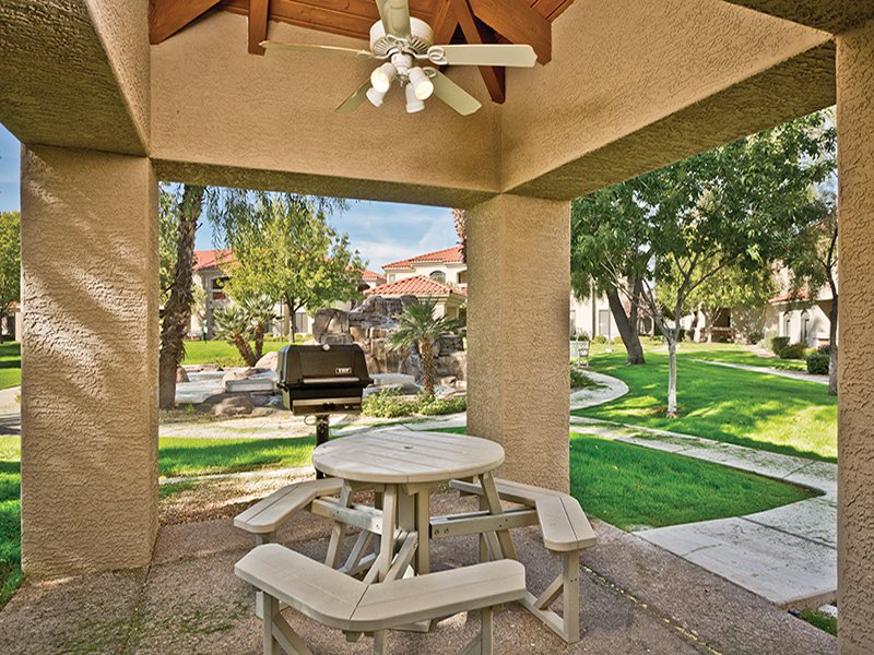 Several BBQ areas with gas grills and cabanas for shade