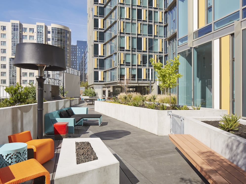 Outdoor chill lounge with common area seating and fireplace