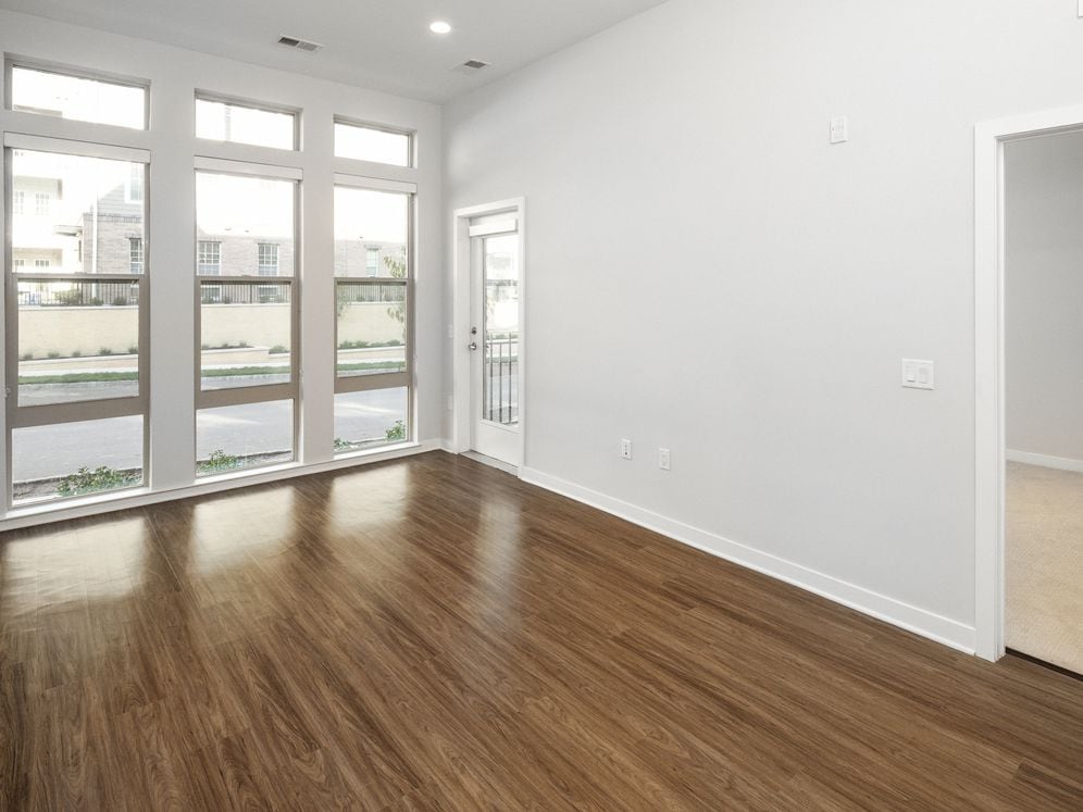 Floor-to-ceiling windows in living/dining areas (in select apartments)