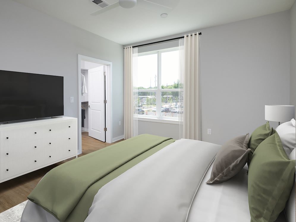 Signature Collection Primary bedroom with hard-surface vinyl plank flooring