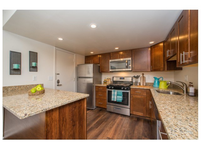 Newly remodeled kitchens with plenty of beautiful granite counter space