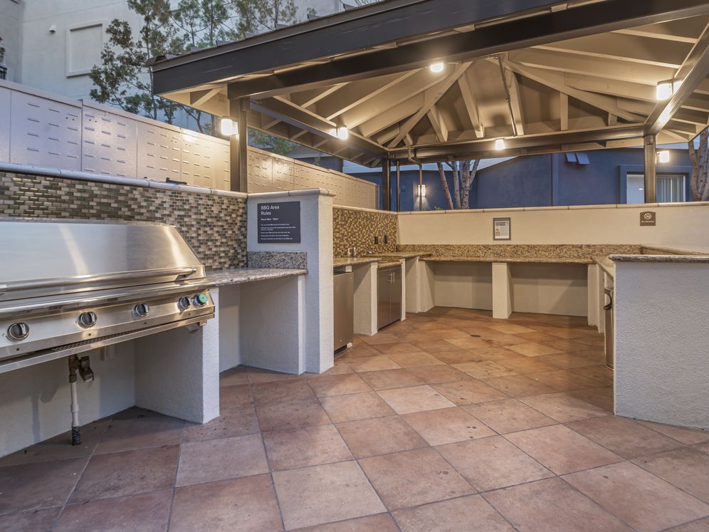 Outdoor kitchen with barbeque grills