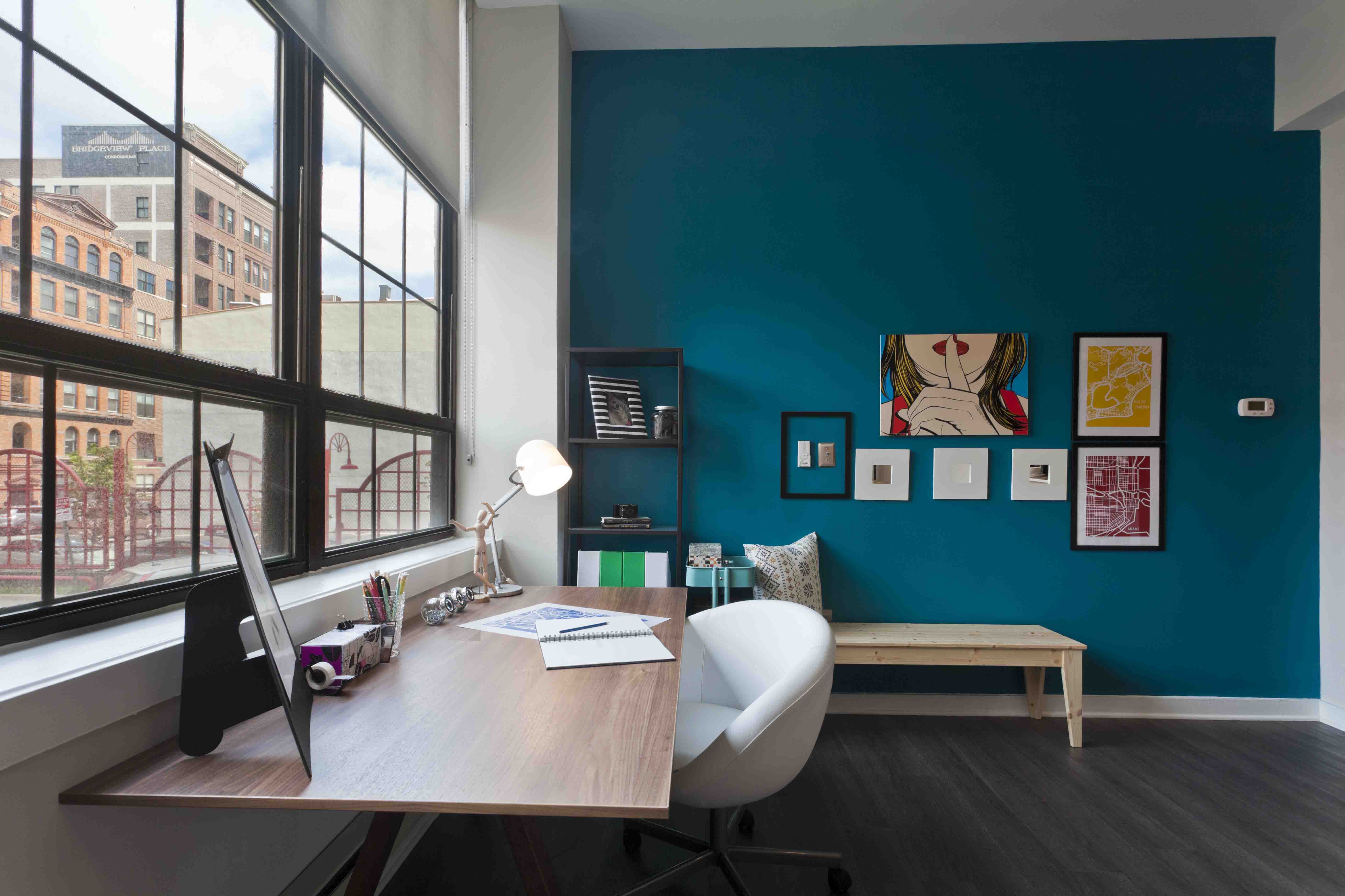 Oversized windows that bathe apartment with natural light