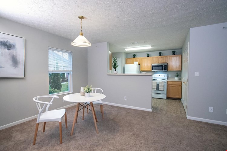 Kitchens feature a breakfast bar overlooking the dining area.