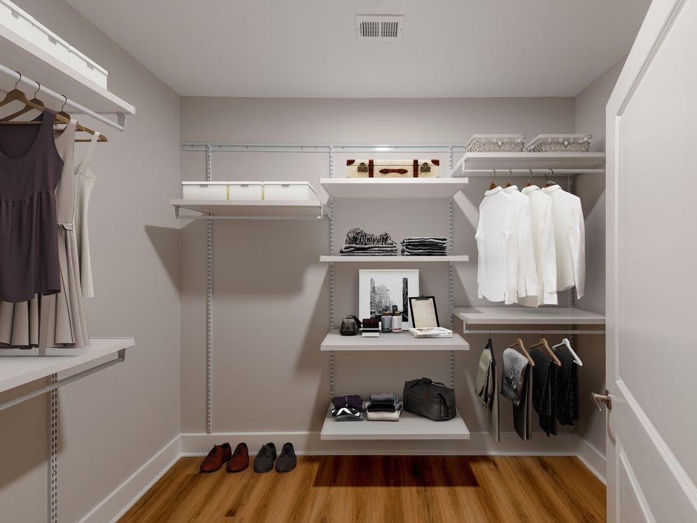 Penthouse-level Signature Collection apartment home walk-in closet with customizable shelf system