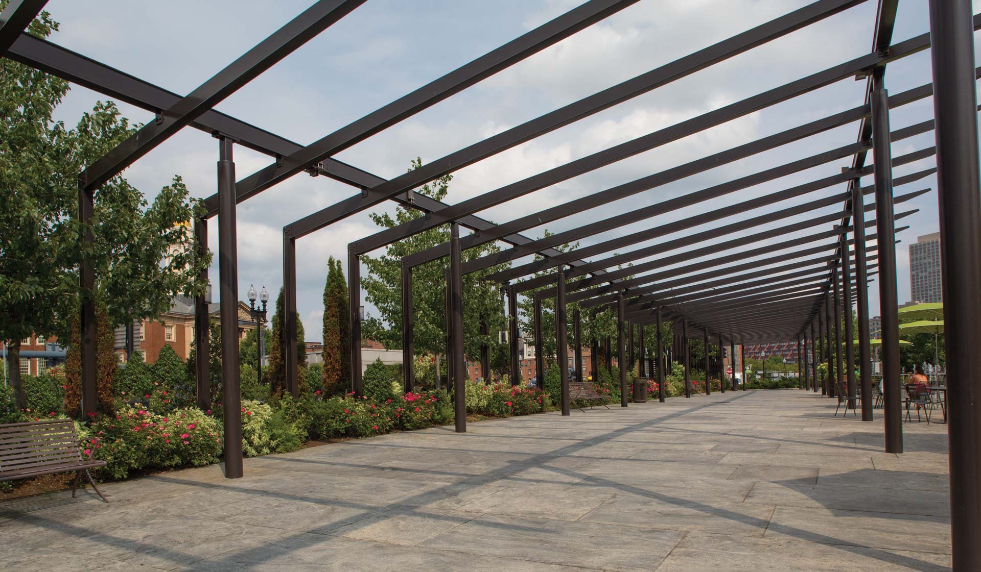 Visit one of the contemporary parks at Rose Kennedy Greenway, just next door
