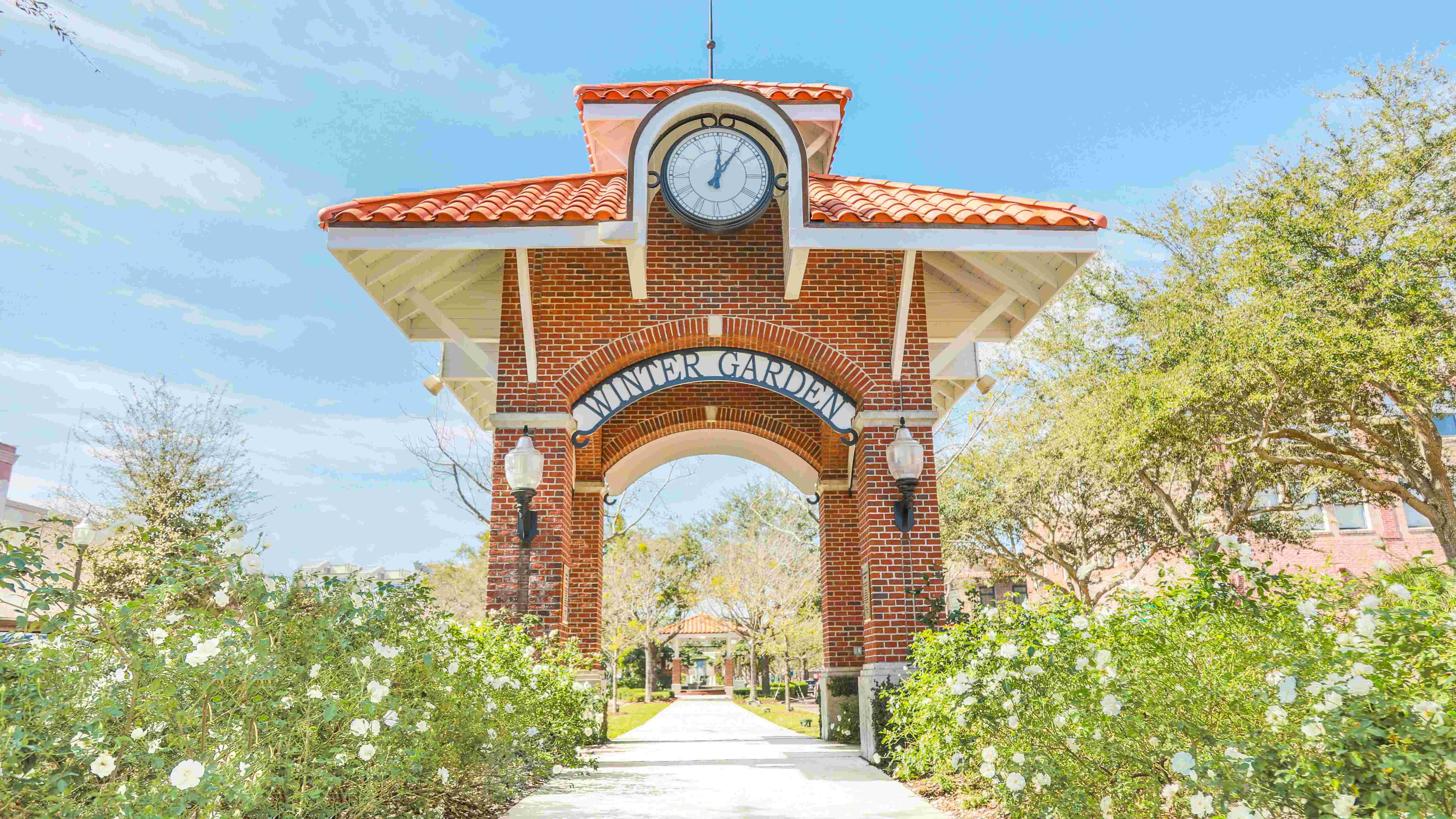 The iconic Centennial Clock Tower, a gathering spot for Winter Garden's vibrant events. 