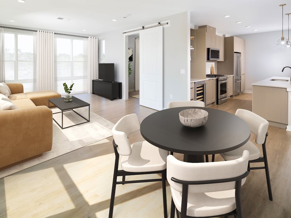 Signature Collection Dining and living areas with hard-surface vinyl plank flooring