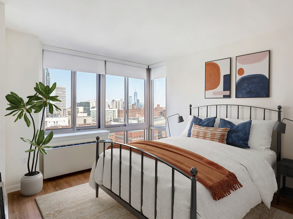 Updated Finishes bedroom with hard surface flooring