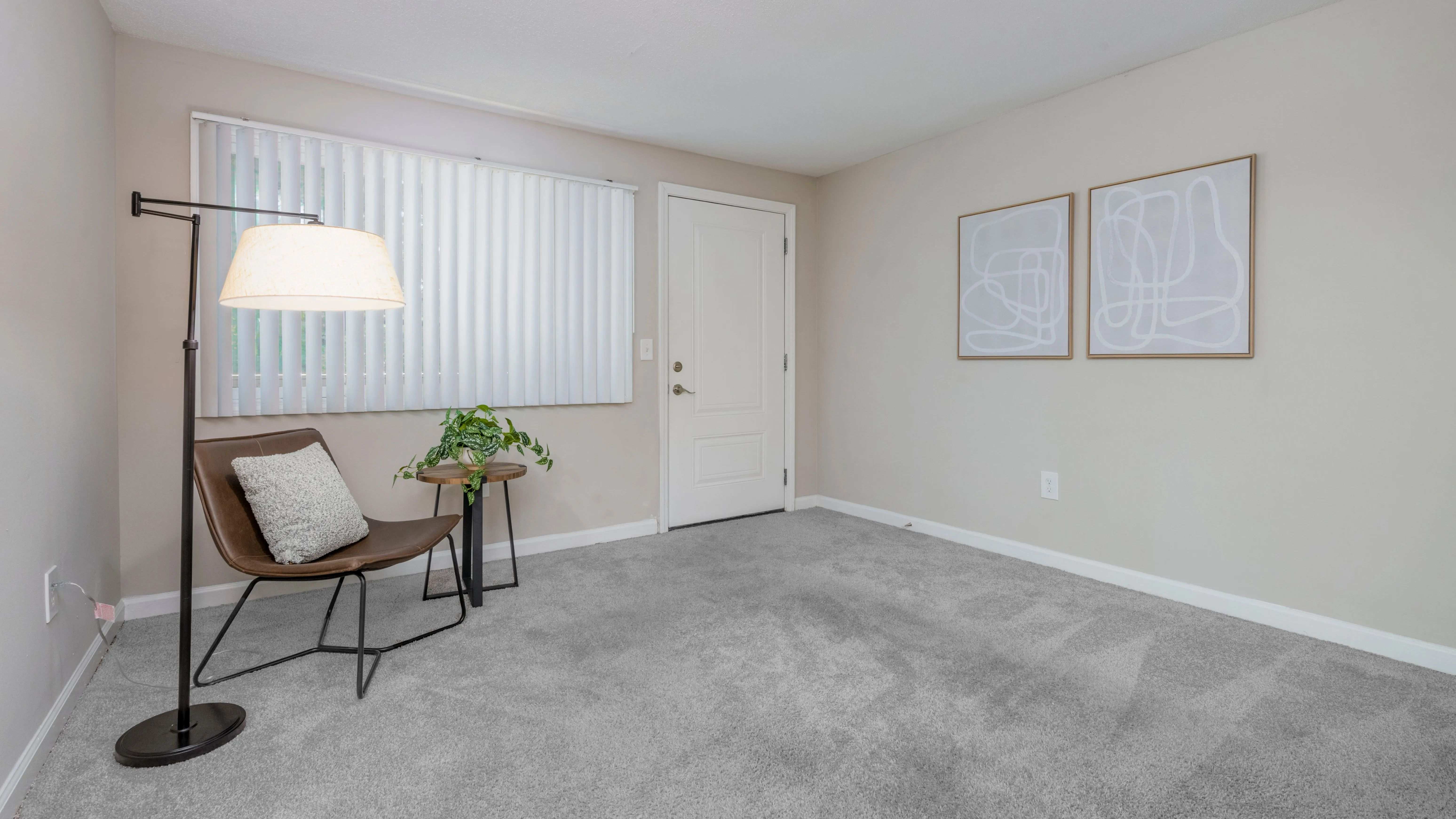 Discover cozy perfection in your apartment living experience. Living rooms offer plush carpeting, adjustable blinds, and a picturesque window making your apartment a dream come true.