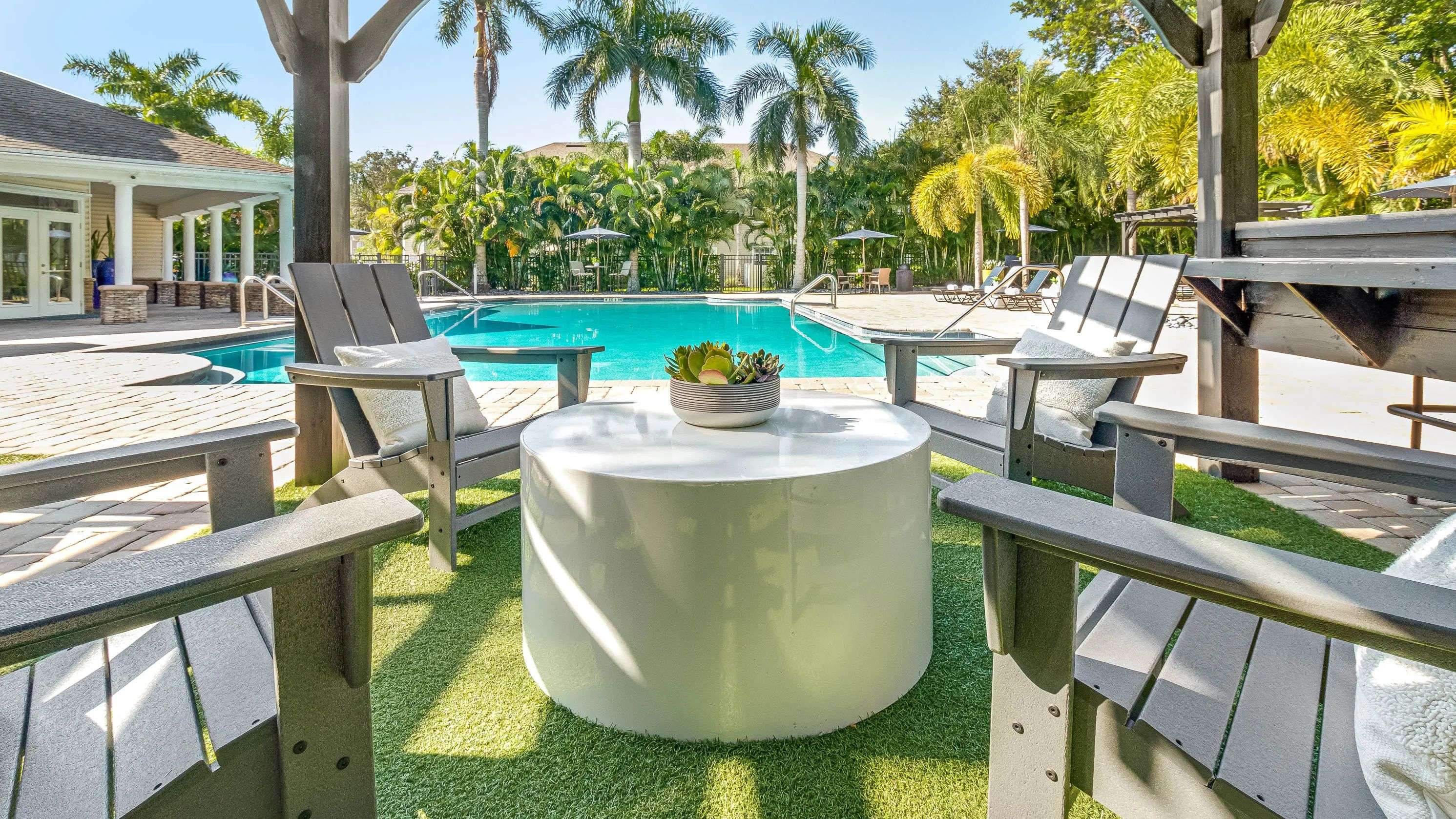 Relax on the spacious sundeck with free poolside Wi-Fi - a stylish space for residents to unwind and stay connected. 