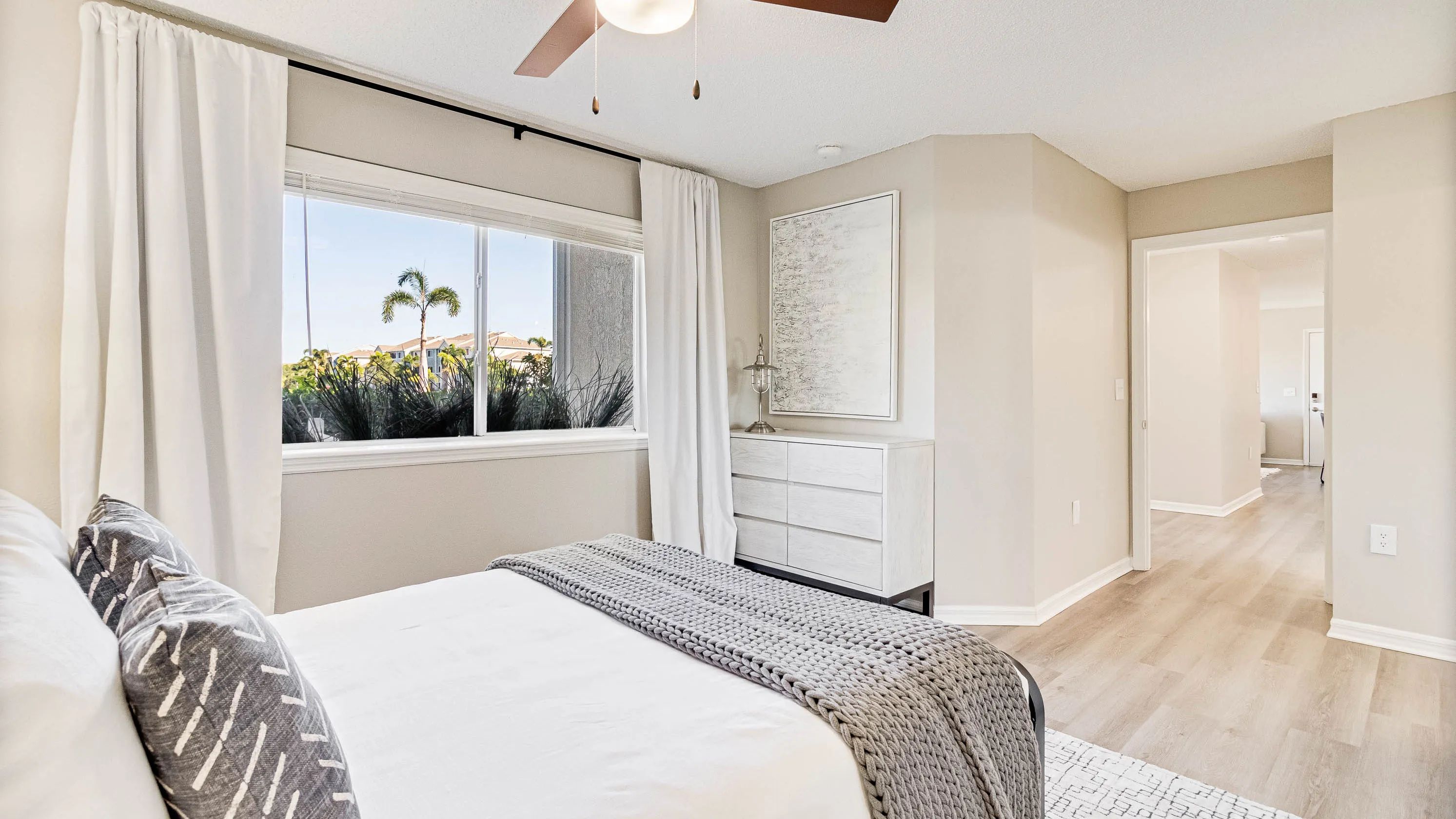 Step into our spacious bedroom, where wood-style flooring or plush carpet cradle your every step.