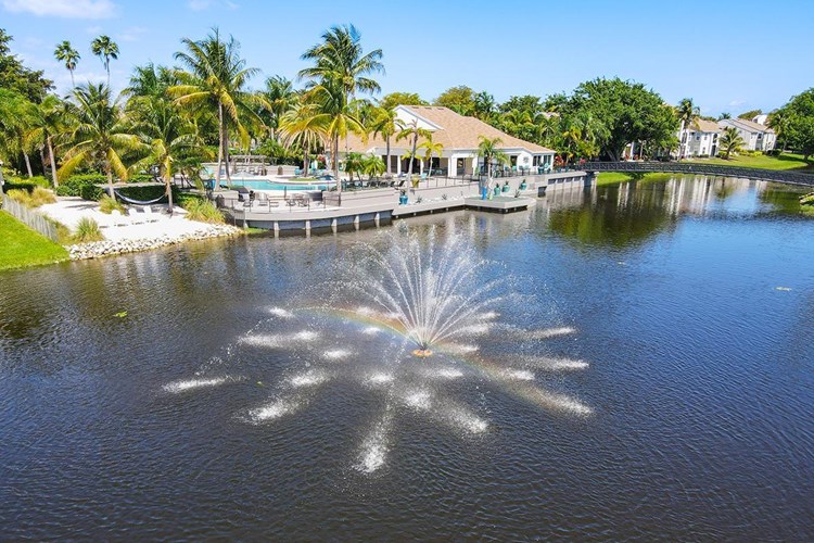 Enjoy the beach with a view out toward our own community lake fountain. 
