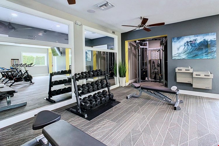 Our fitness center is complete with plenty of free weights.