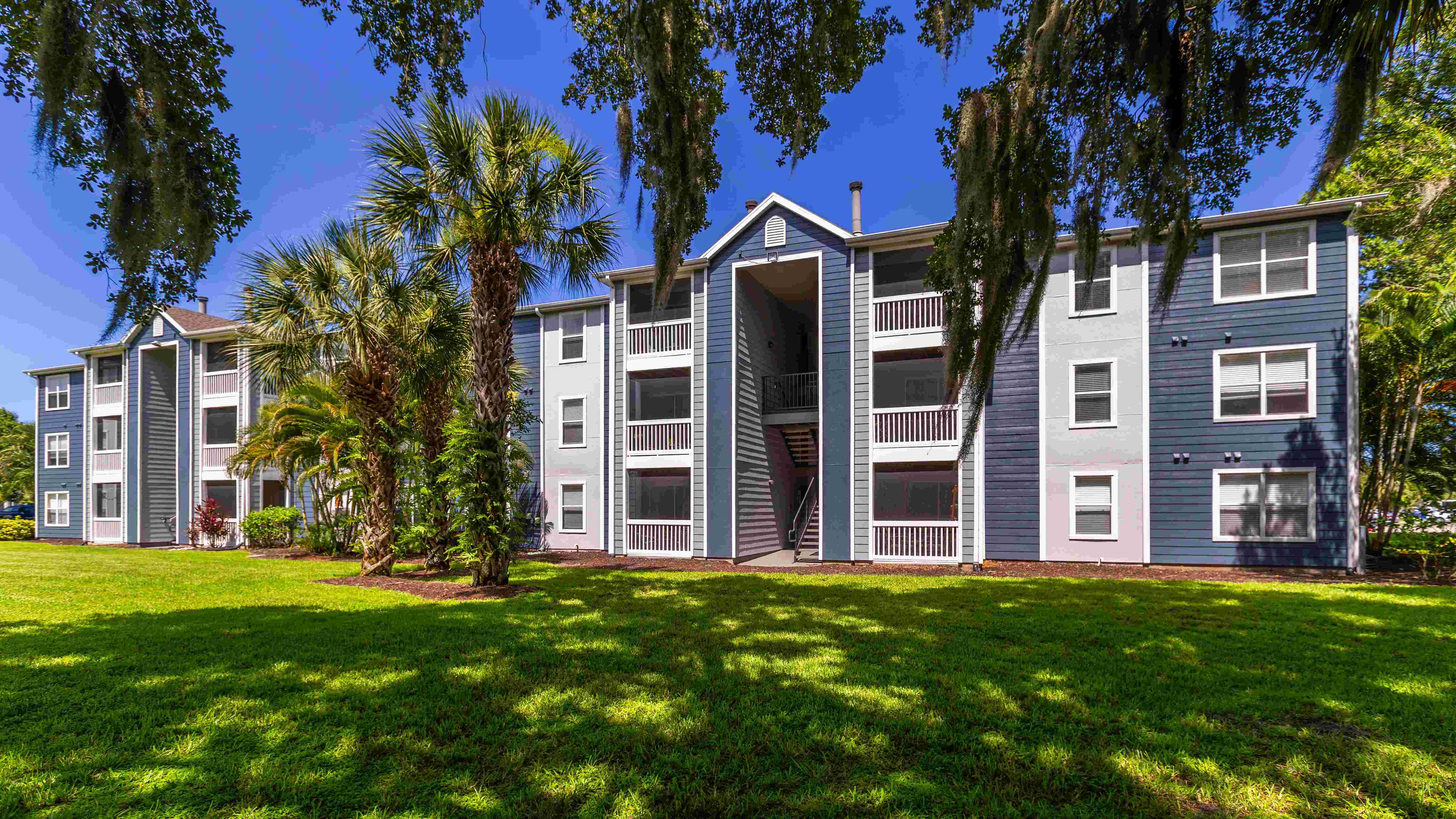 Enjoy the perfect blend of comfort and nature at Grand Oaks, where shady trees, vibrant landscaping, and private screened-in patios create a welcoming Florida retreat.