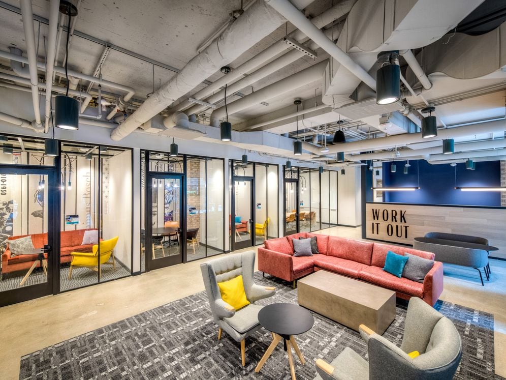 Co-working lounge with private study pods and conference room