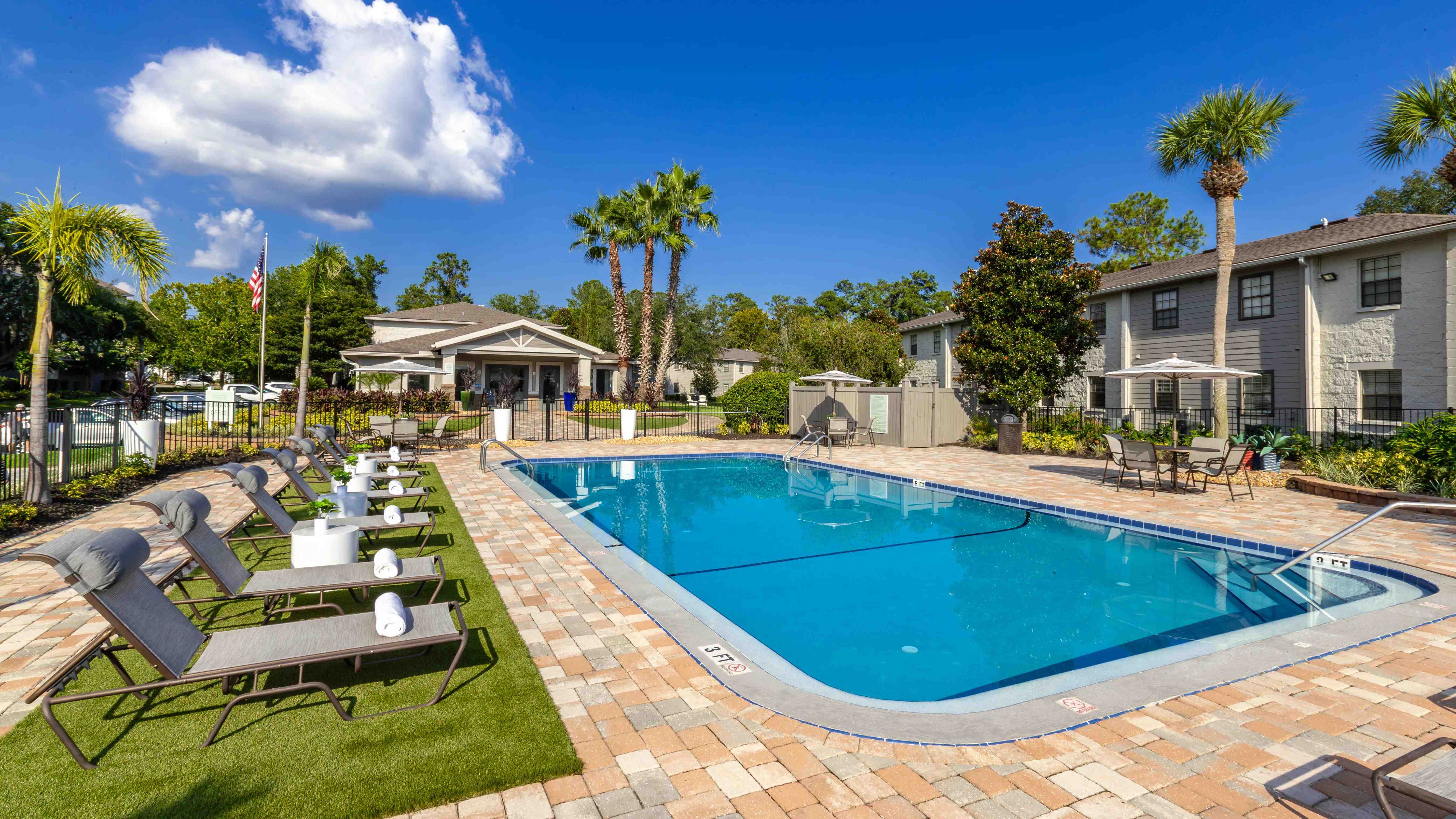 Immerse yourself in the newly renovated resort-style pool, surrounded by ample lounge seating for basking in the Florida sunshine.